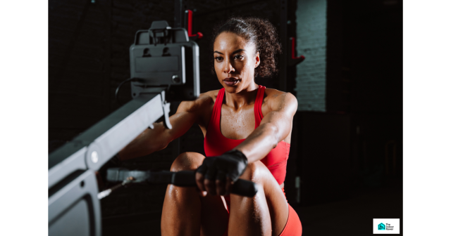 Athlete performing an indoor rowing workout on a rowing machine