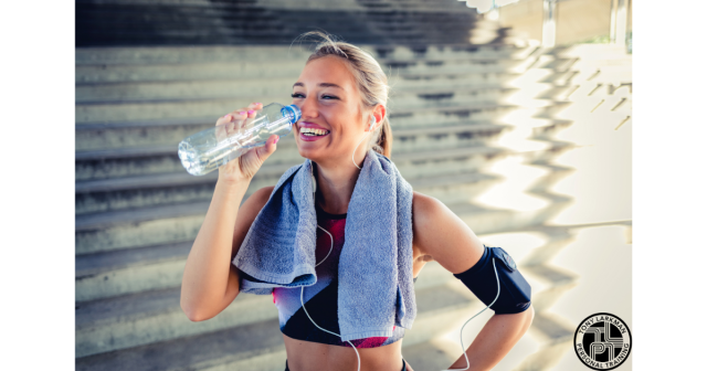 electrolytes after workout hydration female athlete drinking water post exercise