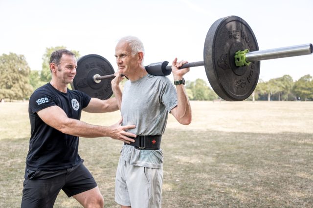 Tony Larkman, Personal Trainer in Bath, coaching a client over 50 during a strength training session.