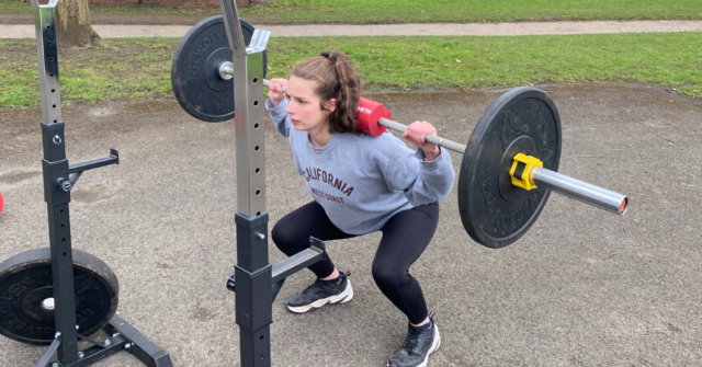 Bethan squatting to increase her leg power