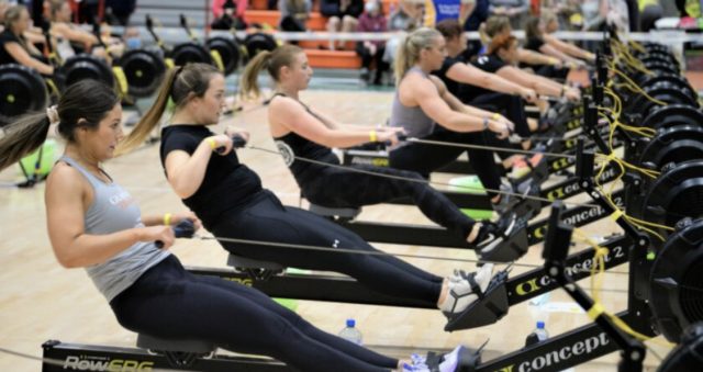 Women's indoor rowing race in action