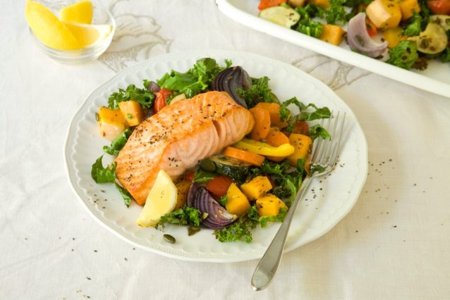 roasted salmon and vegetables on a plate