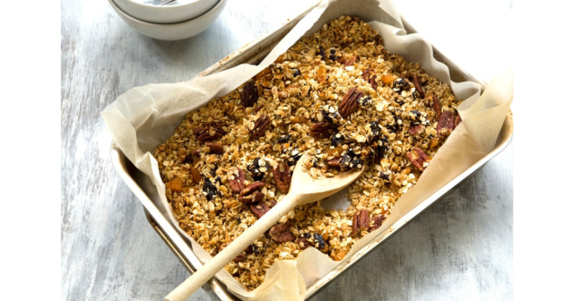 roasting tin of cooked granola