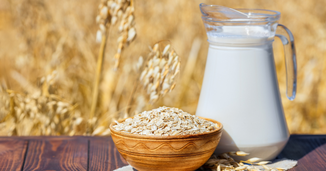 jug of oat milk and bowl of oats