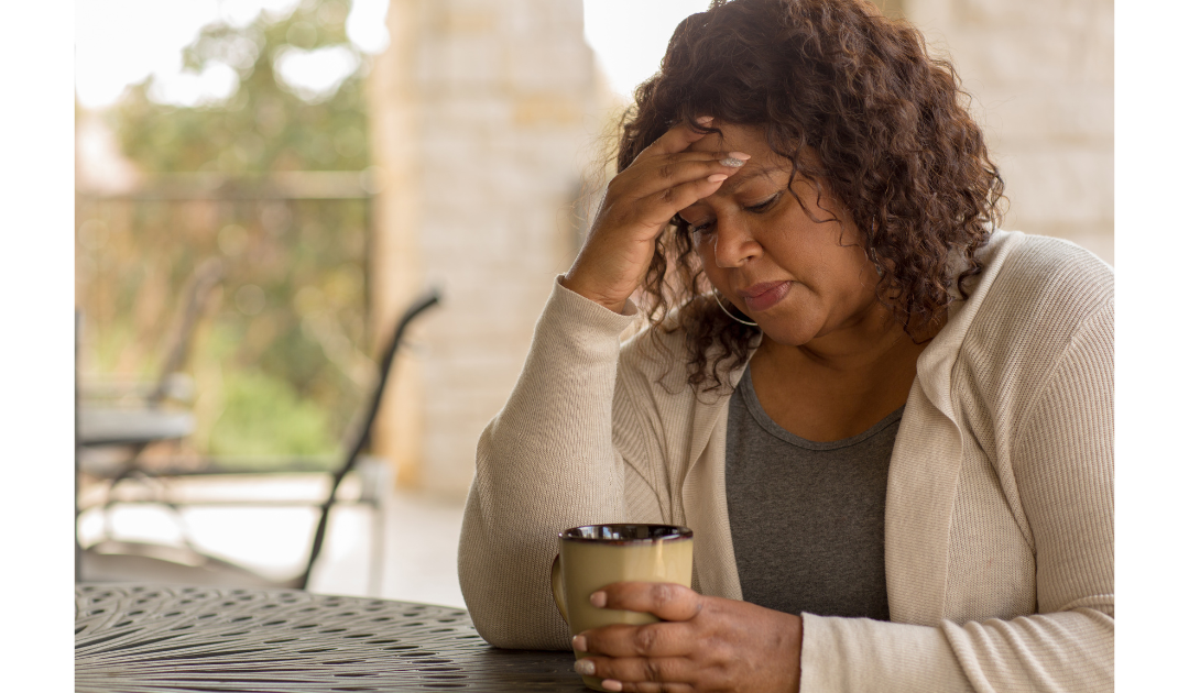 woman feeling down drinking coffee