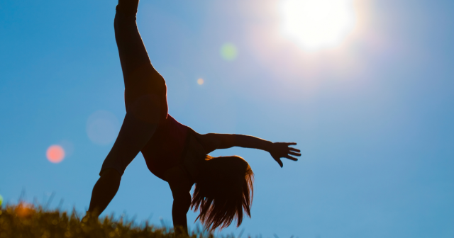 woman performing yoga in the sun